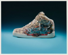 High-end design: An “Air Force 1” sneaker featuring physical and digital forms of 47 pairs of Louis Vuitton × Nike Air Force 1s created by late designer Virgil Abloh, is displayed at the “Louis Vuitton × Nike Air Force 1 by Virgil Abloh” exhibition in New York.