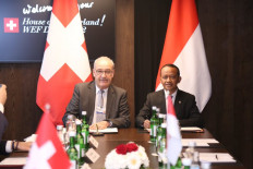 Investment Minister Bahlil Lahadalia and Swiss Federal Councillor Guy Parmelin during the bilateral investment agreement signing ceremony in Davos, Switzerland, on May 25, 2022.