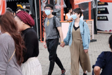 Java Jazz Festival 2020 visitors on JI. Expo Kemayoran wear health masks to protect themselves from COVID-19 on March 1, 2020. The 2022 BNI Java Jazz Festival is bringing back hope for jazz lovers and everyone involved in the industry. 