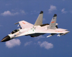 This image obtained August 22, 2014, courtesy of the Department of Defense shows a Chinese fighter jet in a photo taken by a US Navy P-8 crew. 