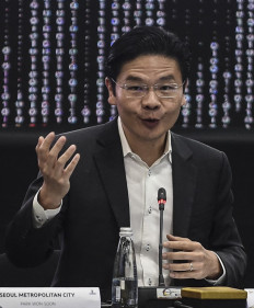 Singapore's Finance Minister, Lawrence Wong, speaks at the closing session of the World Cities Summit in Medellin, Antioquia Department, Colombia, on July 12, 2019. The 2019 World Cities Summit is the first to be held in Latin America and is attended by high-level officials, including mayors, businessmen and experts in urban areas.