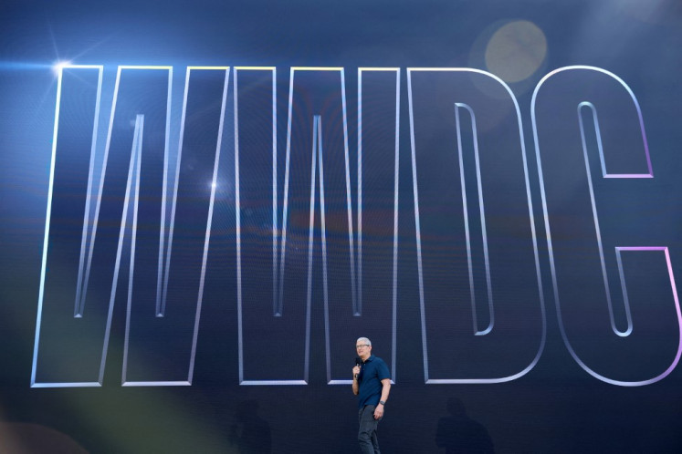 Apple CEO Tim Cook delivers a keynote address during the WWDC22 at Apple Park on June 06, 2022 in Cupertino, California. Apple CEO Tim Cook kicked off the annual WWDC22 developer conference. 