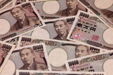Yen jumps; Aussie, kiwi firm ahead of rate decisions