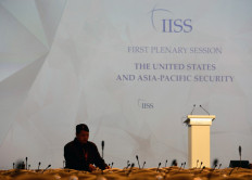 An employee prepares seats for delegates attending US Pentagon chief Jim Mattis' speech for the first plenary session during the 16th Institute for Strategic Studies (IISS), ShangriLa Dialogue Summit in Singapore on June 3, 2017. The annual Shangri-La Dialogue is attended by defence ministers from around the region and runs from June 2 to 4.