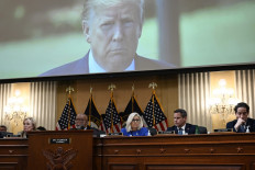 Former US President Donald Trump is seen on a screen during a House Select Committee hearing to Investigate the January 6th Attack on the US Capitol, in the Cannon House Office Building on Capitol Hill in Washington, DC on June 9, 2022. 