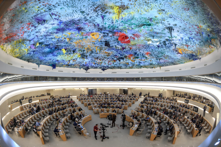 Delegates attend the opening day of the 50th regular session of the United Nations Human Rights Council on June 13, 2022, in Geneva, Switzerland.