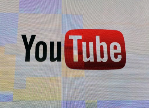 The YouTube logo appears on screen before a keynote address by Vice President of Global Content Partnerships at YouTube Robert Kyncl at the 2012 International Consumer Electronics Show at the Las Vegas Hotel & Casino January 12, 2012 in Las Vegas, Nevada. CES, the world's largest annual consumer technology trade show, runs through January 13 and features more than 3,100 exhibitors showing off their latest products and services to about 140,000 attendees.