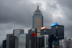 The flag of China is seen in the Admiralty district of Hong Kong on June 12, 2022.
