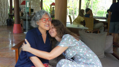 Ida Widowati Wijaya (left) and Hanna Liubychenko share an embrace. Ida, her family and friends hosted Hanna, her two daughters, her sister and the sister’s baby for almost two months in Bali after the Ukrainian family fled the war.