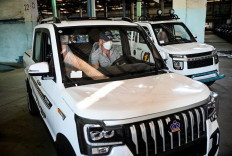 A worker tests an electric car at the Angel Villareal Bravo assembly plant, better known as Minerva Cycles, in Santa Clara, in the Cuban province of Villa Clara, on April 26, 2022.