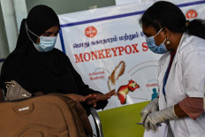 Health workers screen passengers arriving from abroad for monkeypox symptoms at Anna International Airport terminal in Chennai on June 3.