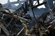 Missiles strike shopping mall southeast of Kyiv, 16 killed