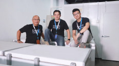 Fresh Factory CEO and founder Larry Ridwan (center) poses for a photo with team members Widijastoro Nugroho (left) and Andre Septiano (right).