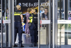 Dutch police officers stand guard at the entrance of the TEFAF Art Fair in Maastricht on June 28, 2022, following a robbery.