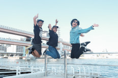 Meet the band: Saturday Night Karaoke – consisting of Athif (left), Prabu Pramayougha (center) and Andresa Nugraha (right) – will release its new four-track record in August. (Courtesy of Bayu Kibo)