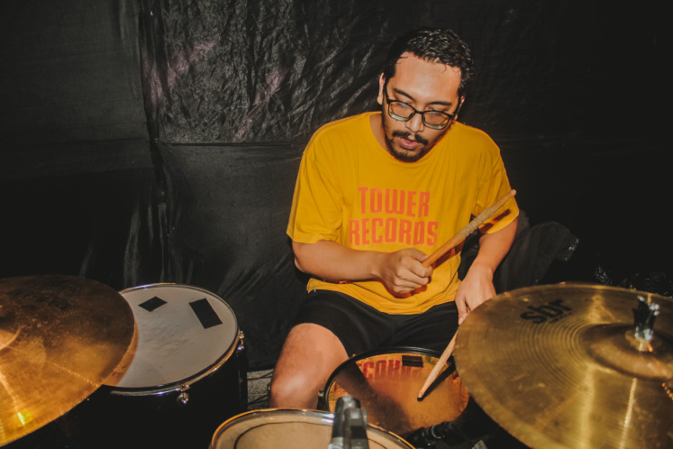 The drummer: Athif has been joining the group as a drummer since 2015. (Courtesy of Ibrahim Partogi)