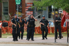  Police arrest suspect after gunman kills six at US July 4 parade 
