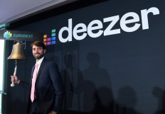 Deezer CEO Jeronimo Folgueira poses after the Deezer's listing ring the ball ceremony on the Pan-European stock exchange Euronext at Euronext headquarters in La Defense business district near Paris on July 5, 2022. 