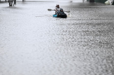 Thousands more evacuate in Sydney even though heavy rains ease