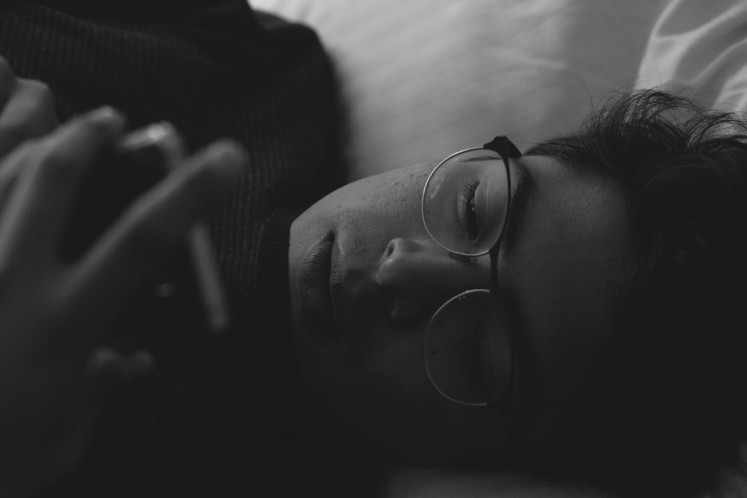 Pillow talk?: Ryu admits that there are several clients that would spice things up with sexual content during sleep call conversations. (Unsplash/Sayo Garcia)