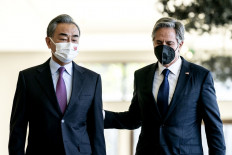 US Secretary of State Antony Blinken (R) and China's Foreign Minister Wang Yi talk before a meeting in Nusa Dua on the Indonesian resort island of Bali on July 9, 2022. 
