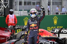Red Bull Racing's Dutch driver Max Verstappen celebrates winning the sprint qualifying at the Red Bull Ring race track in Spielberg, Austria, on July 9, 2022, ahead of the Formula One Austrian Grand Prix.