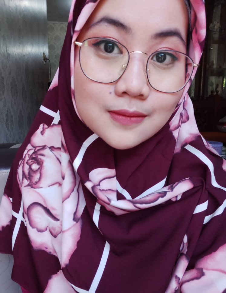 Her wish: Influenced by her father's experience who suffered from liver cirrhosis, Reyfanny Jullianty decided to donate her corneas through Lions Eye Bank Jakarta after she dies.(JP/Reyfanny Jullianty)