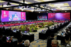 Center of attention: Indonesia's Foreign Minister Retno LP Marsudi (on screen) speaks during a meeting at the Group of 20 Foreign Ministers' Meeting in Nusa Dua, Bali, on July 8. 