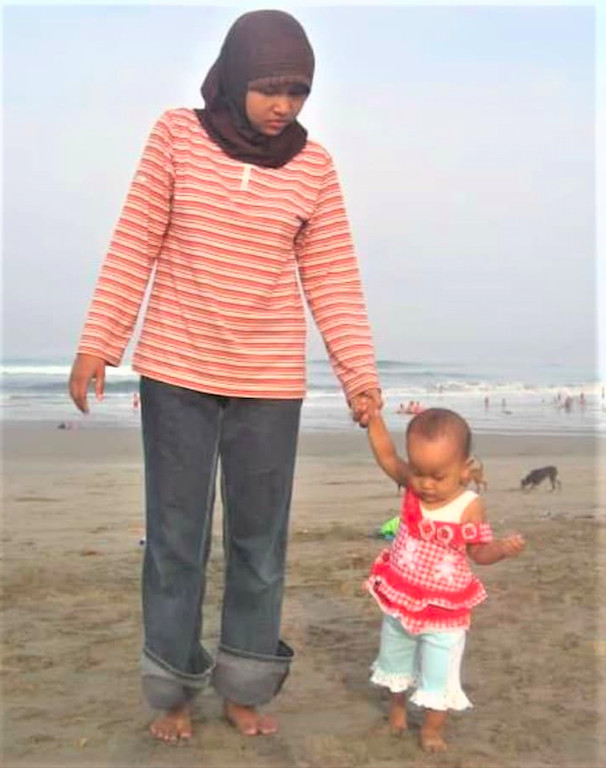 Memories: Reminiscing Pika’s childhood, Santi Warastuti is hopeful that her daughter will eventually get a better treatment in Indonesia. (Courtesy of Santi Warastuti) 