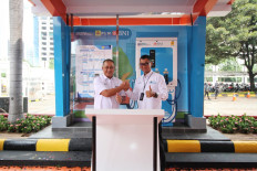 BNI president director Royke Tumilaar (left) and PLN president director Darmawan Prasodjo (left) at the inauguration of the SPKLU Skema Partnership Investor Own Investor Operate (IO2) BNI-PLN on Tuesday. This strategic step with PLN is aimed to support an ecosystem for electronic vehicles (EV) to accelerate the energy transition in Indonesia.