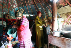 Farmers make "kumis" inside a yurt at a high altitude summer pasture called Suusamyr, some 170 km (106 miles) south of the Kyrgyz capital Bishkek. 