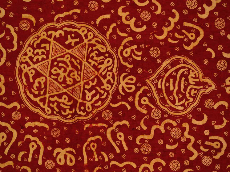 Unique touch: Besurek typically incorporates Arabic caligraphy into its patterns. (Flickr/Peter D. Tillman)