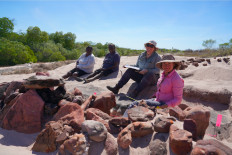 Archeologists from the Western Australia Museum dig up artifacts left by Indonesian fishermen in Western Australia. 