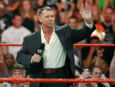 Stepping down: World Wrestling Entertainment Inc. chairman Vince McMahon appears in the ring during the WWE Monday Night Raw show at the Thomas & Mack Center on Aug. 24, 2009, in Las Vegas, Nevada, the United States.