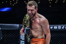 Reinier de Ridder celebrates inside the Circle after defeating Vitaly Bigdash with an inverted-triangle choke at ONE 159 on July 22.

