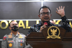 National Commission on Human Rights (Komnas HAM) commissioner Choirul Anam talks to the press at the commission’s office in Jakarta on July 25, 2022.