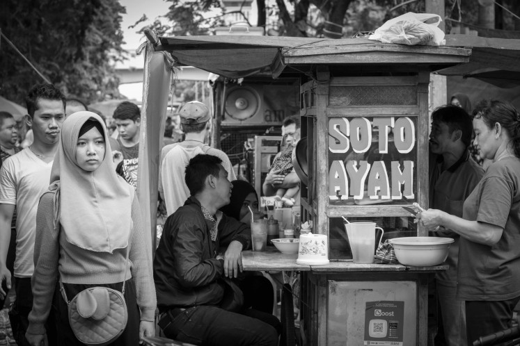 Street food: A popular comfort food that's readily available all day long, soto ayam is probably the most common variant. (Unsplash/Hobi Industri)