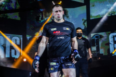 Belarusian mixed martial arts (MMA) fighter Kirill Grishenko walks into ONE Championship’s Circle ahead of his world title bout with Anatoly Malykhin in February. 