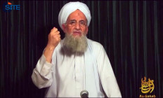 A still image from a video released by Al-Qaeda’s media arm as-Sahab and obtained on September 11, 2012 courtesy of the Site Intelligence Group shows al-Qaeda leader Ayman al-Zawahiri in a video, speaking from an undisclosed location on the eleventh anniversary of the 9/11 attacks. 