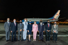 United States House of Representatives Speaker Nancy Pelosi (fourth right) appears with members of her delegation in a handout photograph taken upon their arrival at Taipei Songshan Airport and released by Taiwan’s Ministry of Foreign Affairs on Aug. 2, 2022.