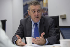 President and CEO of the Federal Reserve Bank of St. Louis James Bullard speaks during an interview with AFP in Washington, DC, on Aug. 6, 2019. In  a speech at New York University on Tuesday, Bullard said the United States and the European Union could still avoid recession.