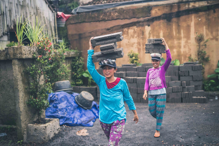 Breaking stigmas: Despite living in a mostly patriarchal society, it's actually been common for most Indonesian women to be the breadwinners of their respective families, like most domestic workers endure.(Unsplash/Artem Beliaikin)