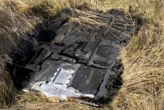 Grounded: Pictured is space debris seen at farmland near Dalgety in the Snowy Mountains region of New South Wales, Australia. The image was taken on July 29 and released by Brad Tucker, an astrophysicist at the Australian National University.