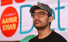 In this file photo taken on March 27, 2019, Bollywood actor Aamir Khan looks on during the launch of a book about weight loss in Mumbai.