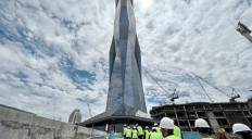Towering pride: Members of the media checking on the work progress of Merdeka 118 Tower in Kuala Lumpur. ­