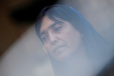 One year on, Afghan family still divided after daughter fled, mother stayed 