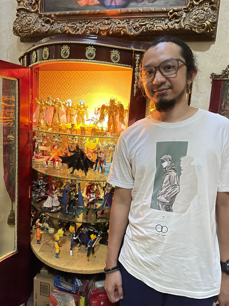 Never too old: 34-year-old Massagoes Yudiscitra who works as a  private sector employee and F&B entrepreneur still collects anime-related action figures. (Courtesy of Massagoes Yudiscitra)