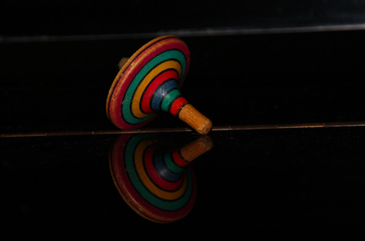 Going round and round: 'Gasing' or a spinning toy was said to be found in the Tujuh Islands (Natuna), Riau Islands, before the Dutch colonization era.(Unsplash/Giovanni Cordioli)