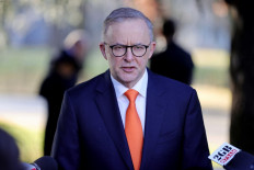 Australian Prime Minister Anthony Albanese speaks with media in Canberra on July 26, 2022. 
