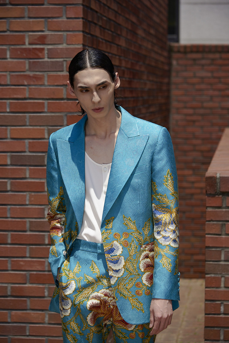 Cross-cultural collab: A model wears a tailored suit from the Iwan Tirta × Kim Seo Ryong Resort Collection 2022/2023, a collaboration between the South Korean designer and luxury batik label Iwan Tirta Private Collection (ITPC). (Courtesy of ASA Medier)